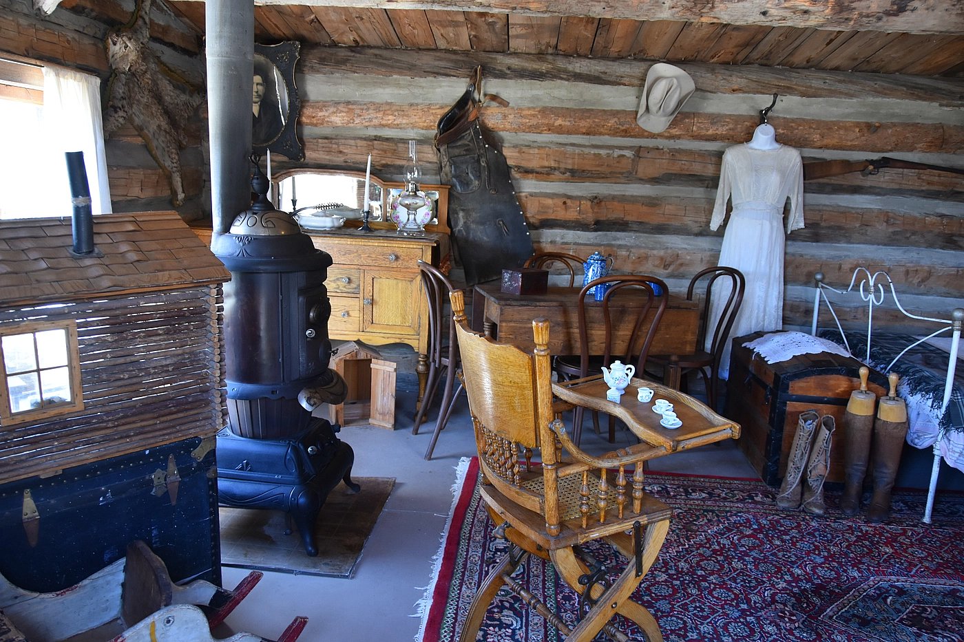 Homesteader cabin furnished with authentic objects at Old Trail Town museum Cody WY