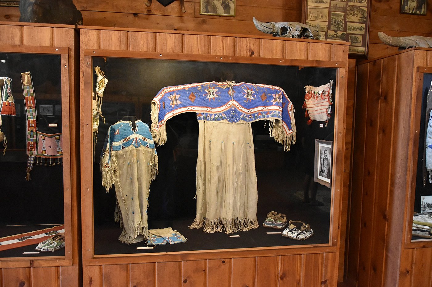 Native American dress with information about the maker