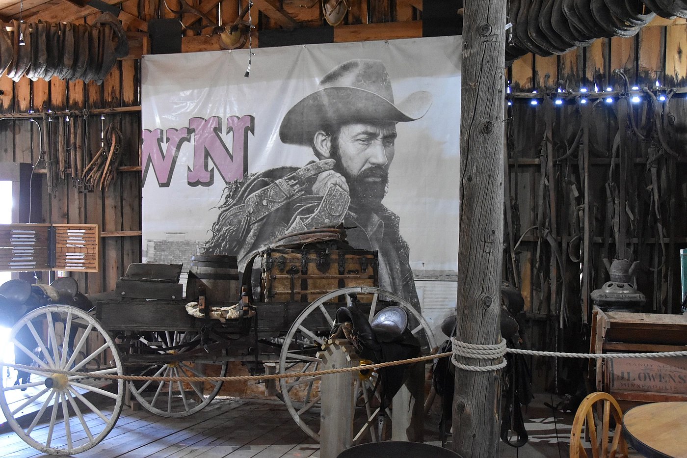Portion of old poster and wagon