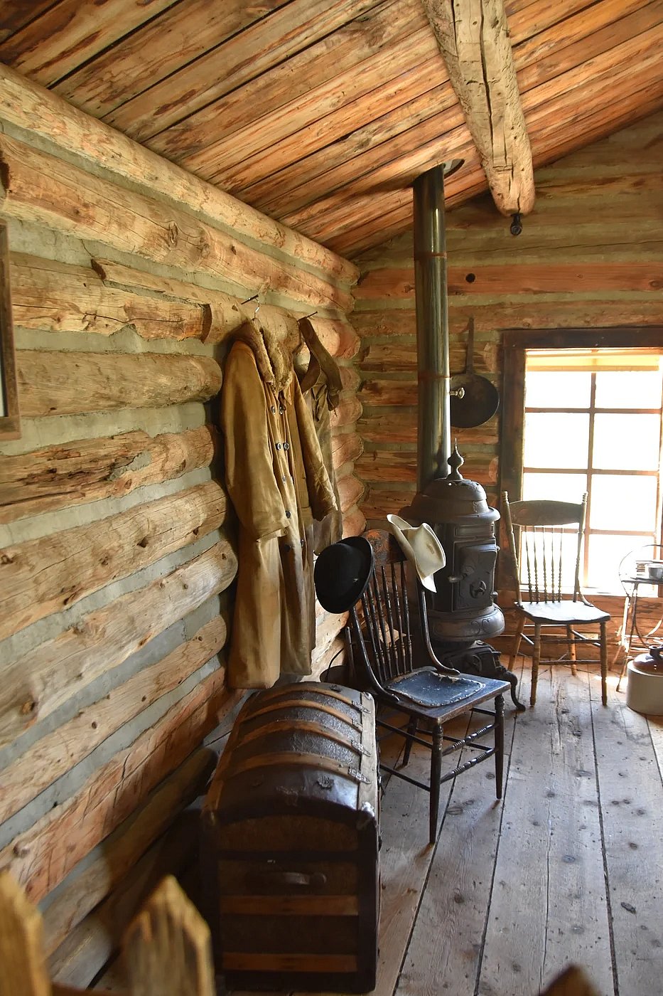Trunk inside the Hole in the Wall cabin conjures imagination in Cody WY
