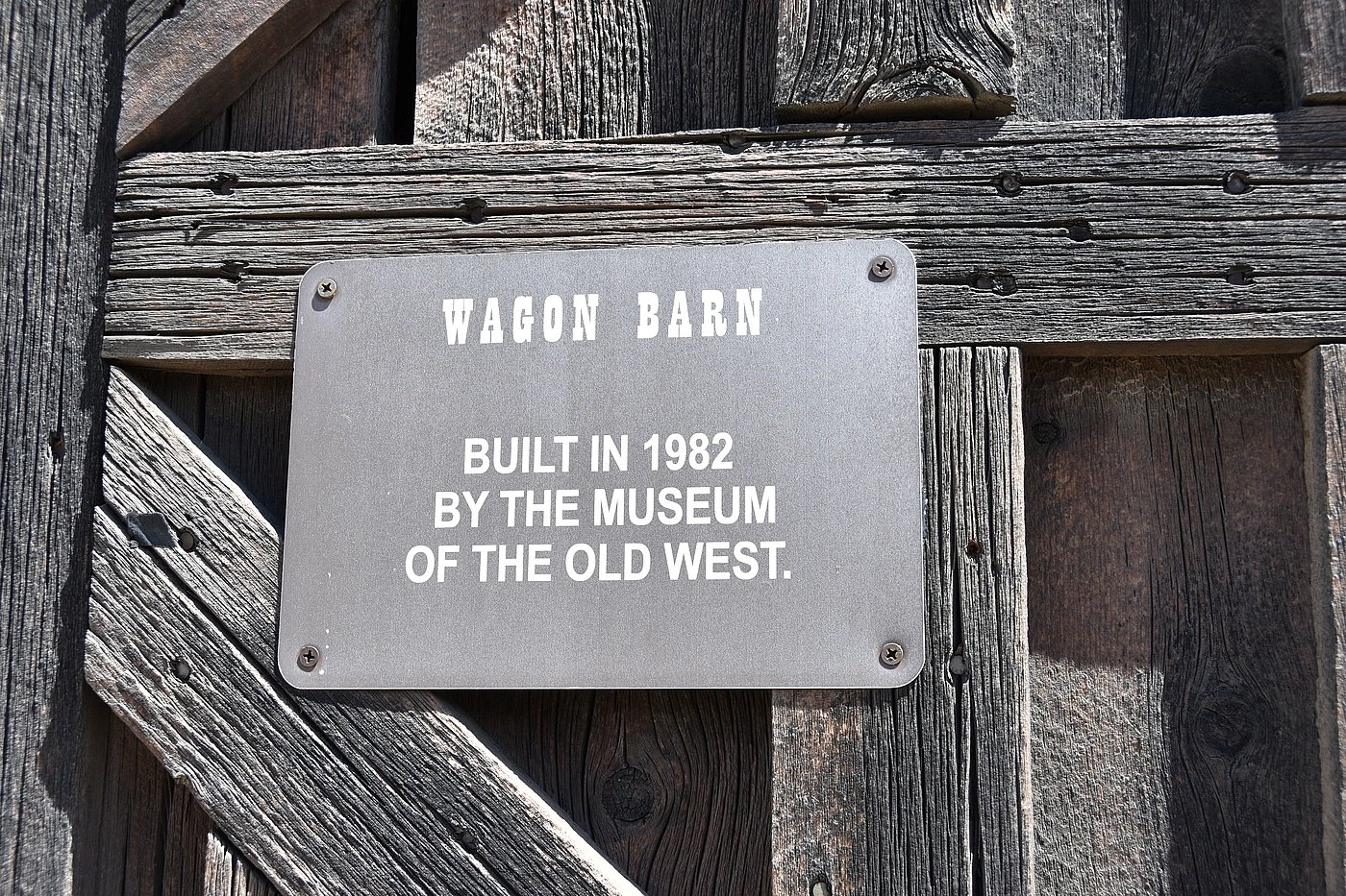Wagon Barn museum label for Museum of the Old West